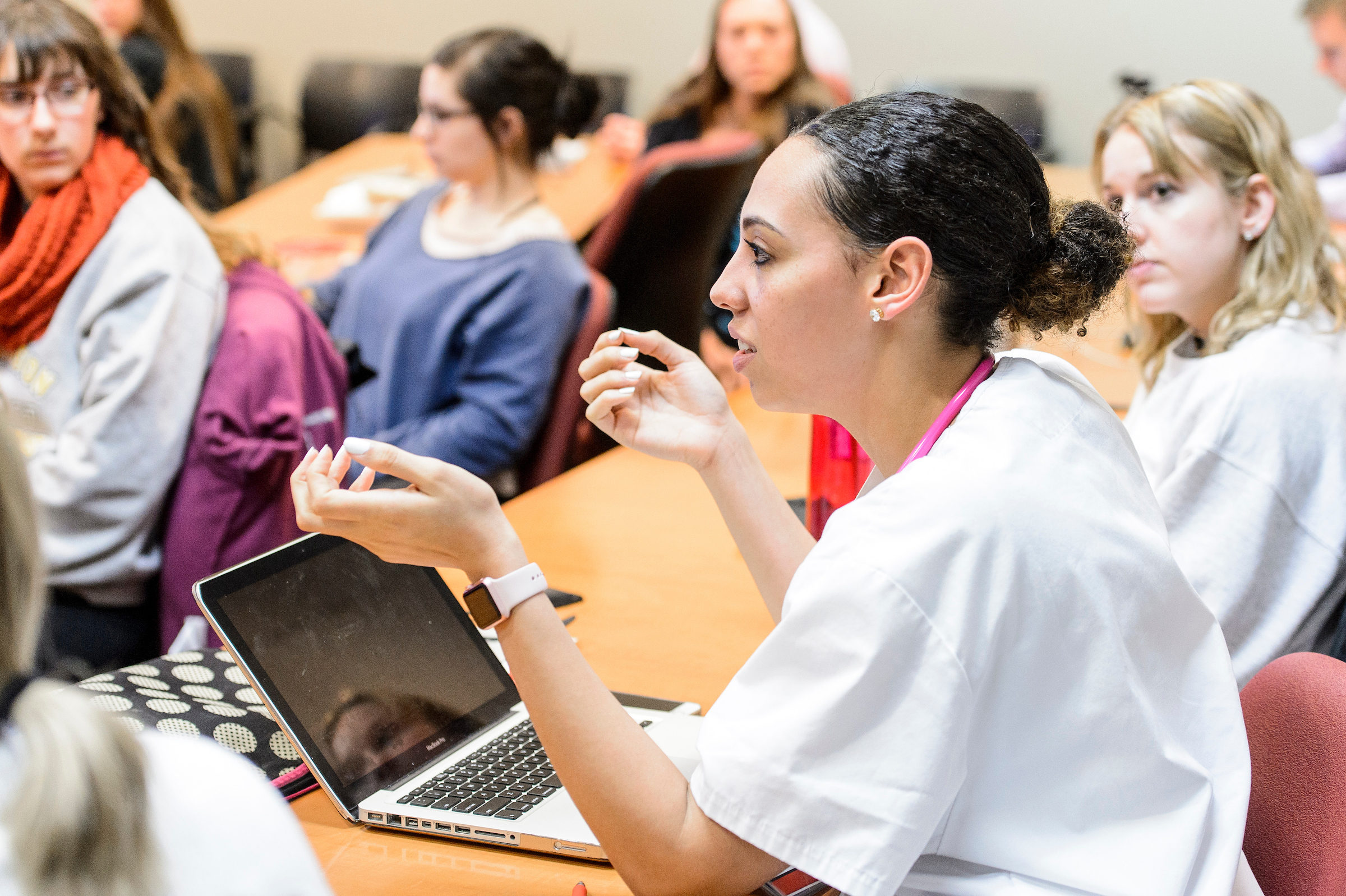 students discussing in class