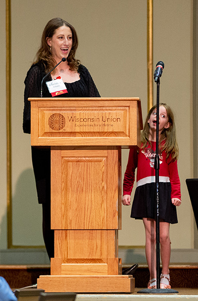 Christine Fifarek, award winner, at the podium with her daughter